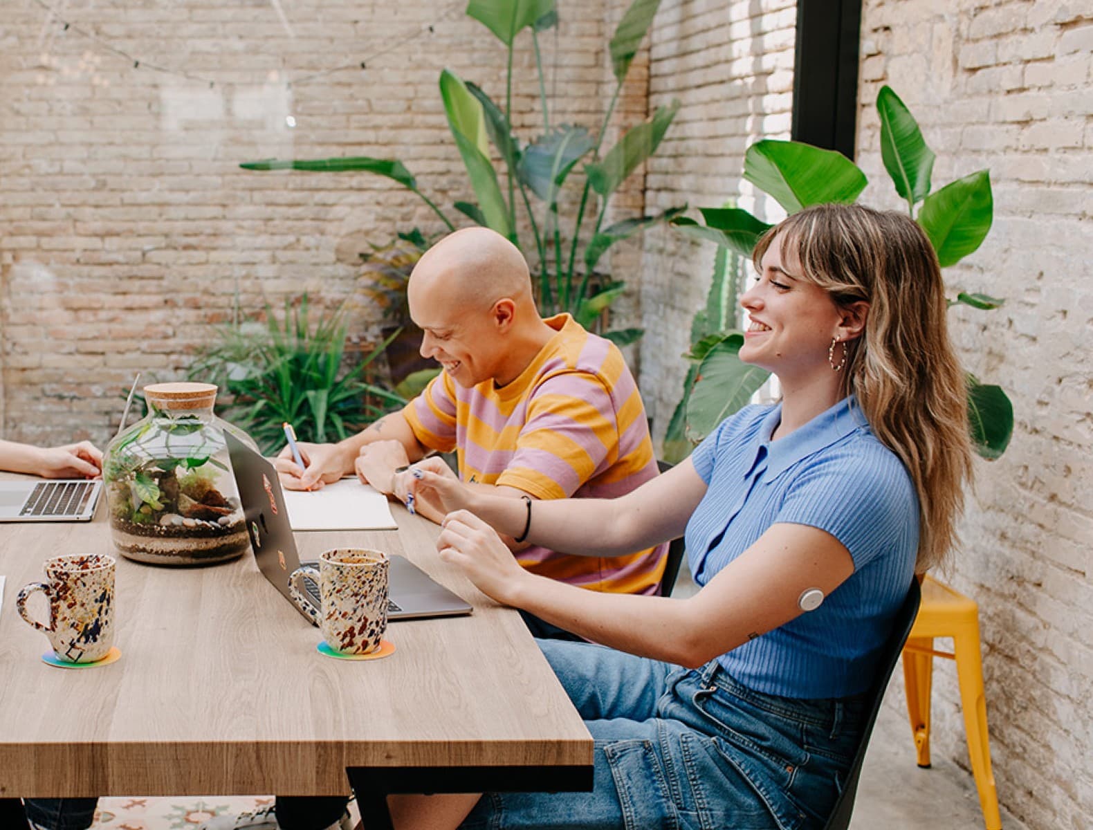 Upsure team collaborating at a table
